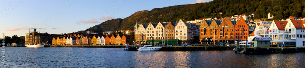 Bergen, Norway - Panoramic view of historic Bryggen district with Hanseatic heritage buildings at the Bergen Vagen harbor