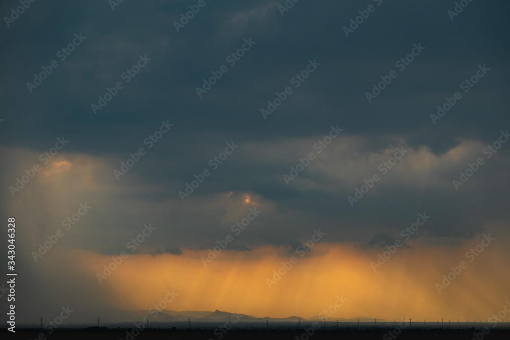 Light in the Dark and Dramatic Storm Clouds background,before the rain Light in the Dark and Dramatic Storm Clouds background,before the rain
