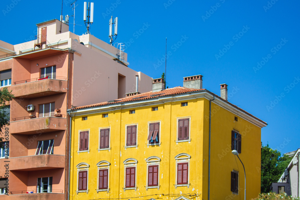 yellow colored building in the old town of Pula, Istrian Peninsula in Croatia