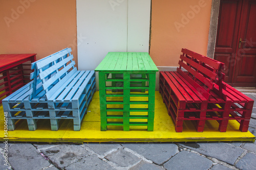 colorful chairs and tables in front of a restaurant in the old town of Pula, Istrian Peninsula, Croatia © Joppi