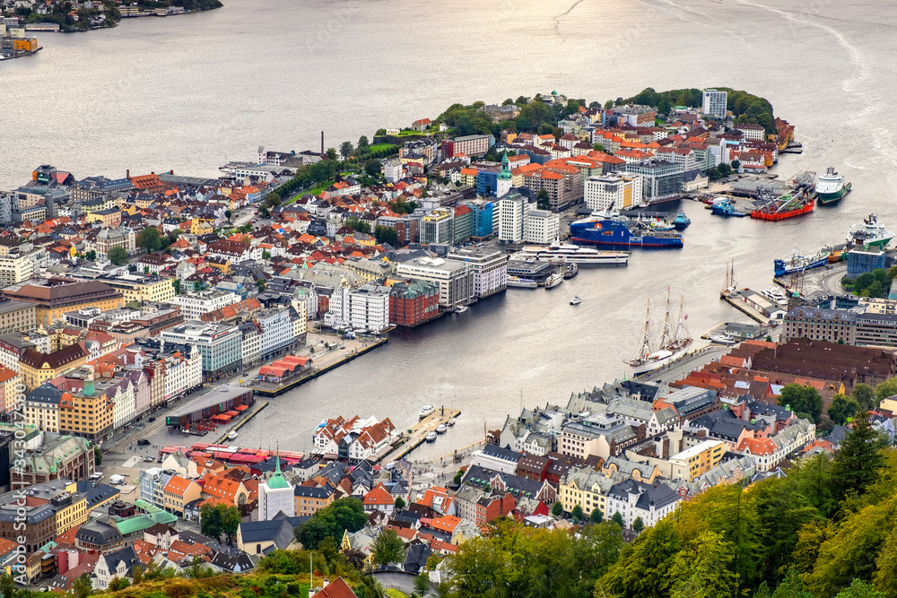 Bergen, Norway - Panoramic city view with Bergen Vagen harbor - Bergen Havn - and historic Bryggen heritage district seen from Mount Floyen