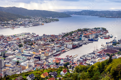 Bergen, Norway - Panoramic city view with Bergen Vagen harbor - Bergen Havn - and historic Bryggen heritage district seen from Mount Floyen