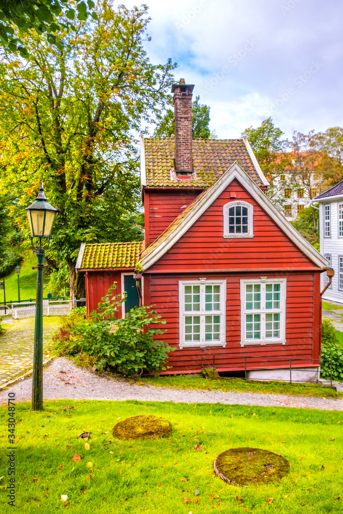 Bergen, Norway - Reconstructed XIX century Norwegian city street with wooden houses in Old Bergen Museum - Gamle Bergen Museum - heritage park