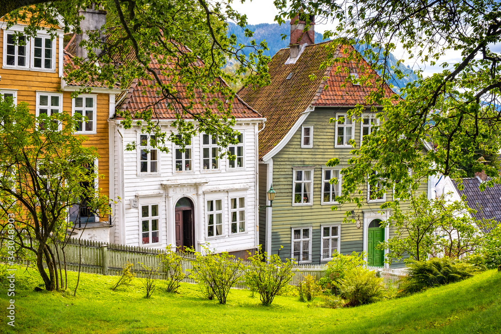 Bergen, Norway - Reconstructed XIX century Norwegian city street with wooden houses in Old Bergen Museum - Gamle Bergen Museum - heritage park