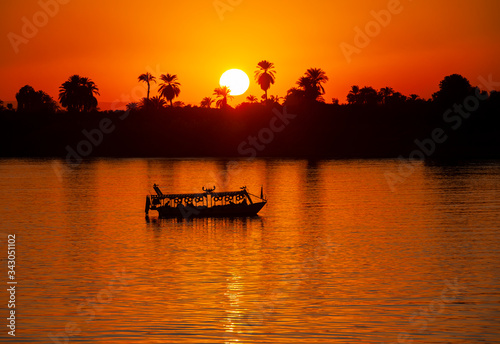 Slika na platnu Landscape view of large river nile in Egypt at sunset