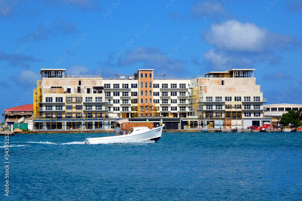 Motor boat drives on water at Aruba, Caribbean