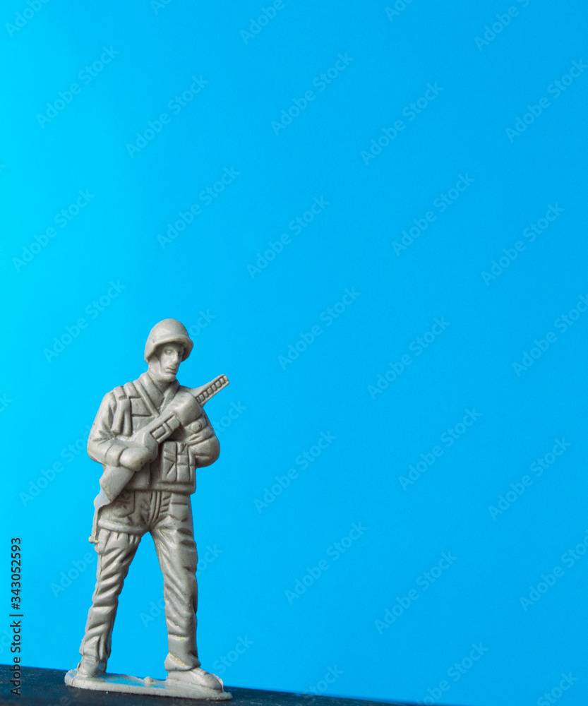 child's salad is standing isolated on a blue background child's salad is standing isolated on a blue background