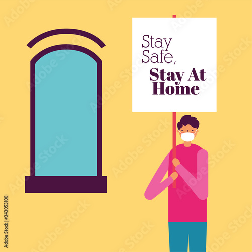 man using face mask for covid19 with stay at home banner