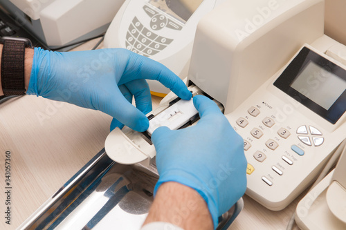Conducting tests in a medical laboratory.