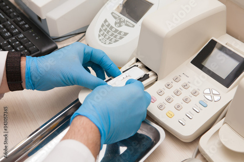 Conducting tests in a medical laboratory.