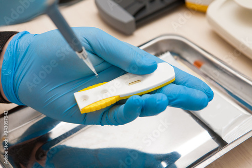 Conducting tests in a medical laboratory.