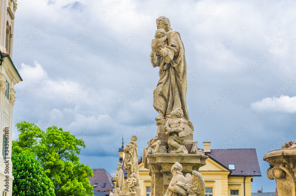 Fototapeta premium Baroque statues of saints in front of Jesuit College, close-up, Kutna Hora historical Town Centre, Central Bohemian Region, Czech Republic