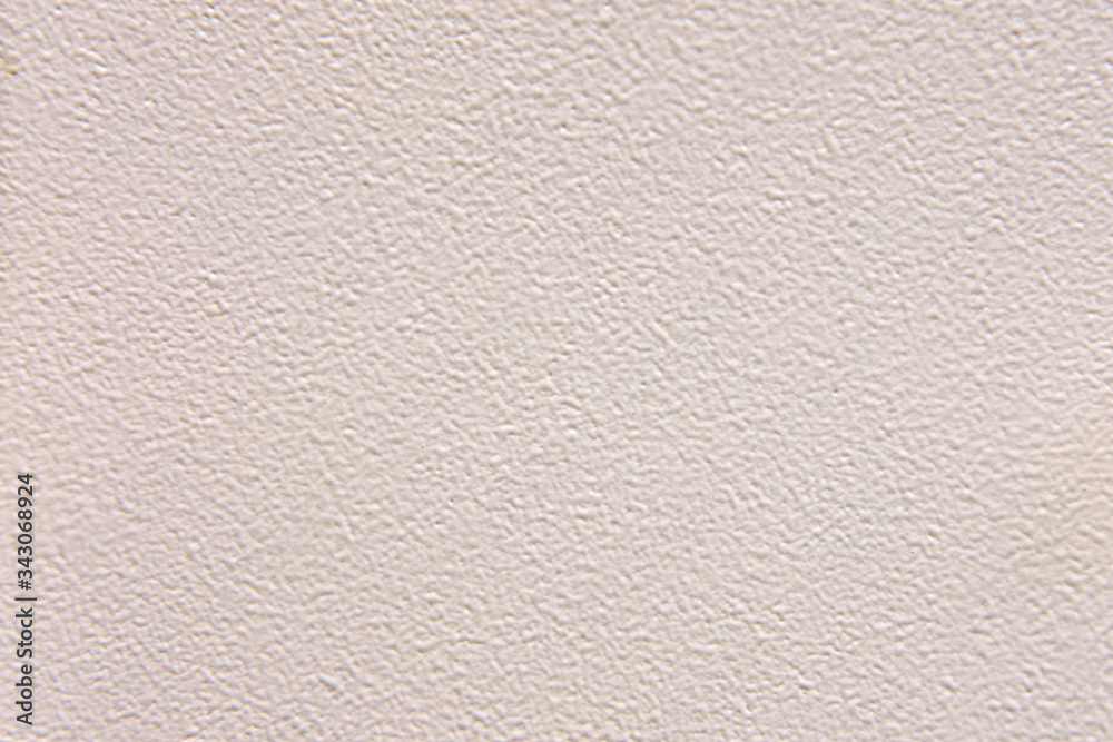 Background of a white rough-painted metal surface with rough edges. Close-up grey metal texture