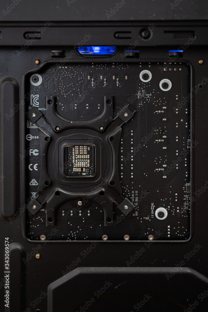 Fototapeta premium computer chips in a black case with blue backlight inside