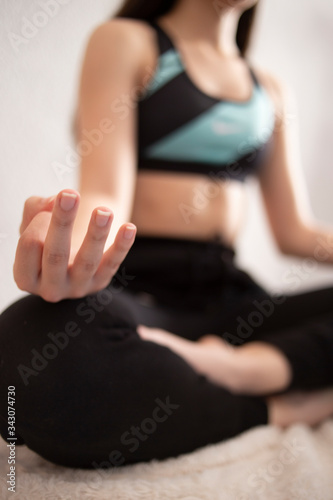  girl doing yoga at home