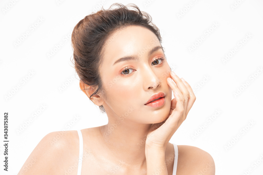 Beautiful Asian woman touching soft cheek smile with clean and fresh skin Happiness and cheerful with positive emotional,isolated on white background,Beauty and Cosmetics Concept