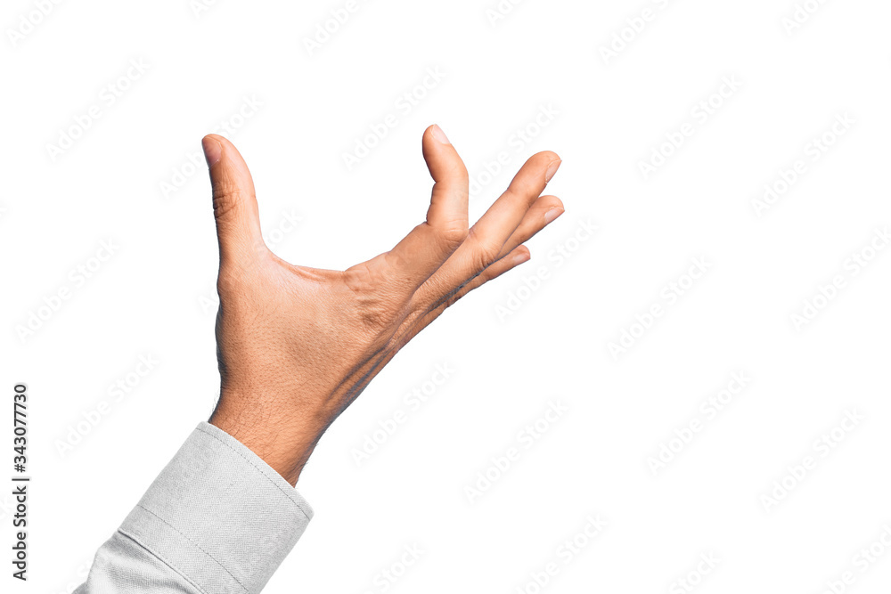 Hand of caucasian young man showing fingers over isolated white background picking and taking invisible thing, holding object with fingers showing space
