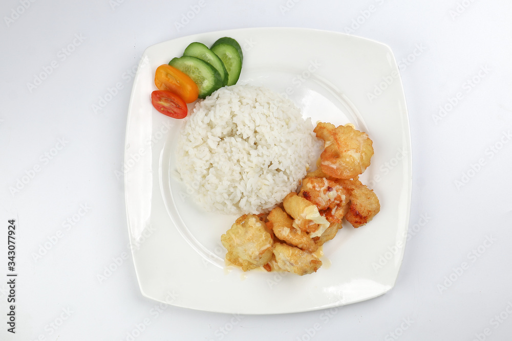 Butter Chicken Rice deep fried boneless chicken cube topped with sweet butter sauce with white rice cucumber and tomato slice Butter Chicken Rice deep fried boneless chicken cube topped with sweet butter sauce with white rice cucumber and tomato slice