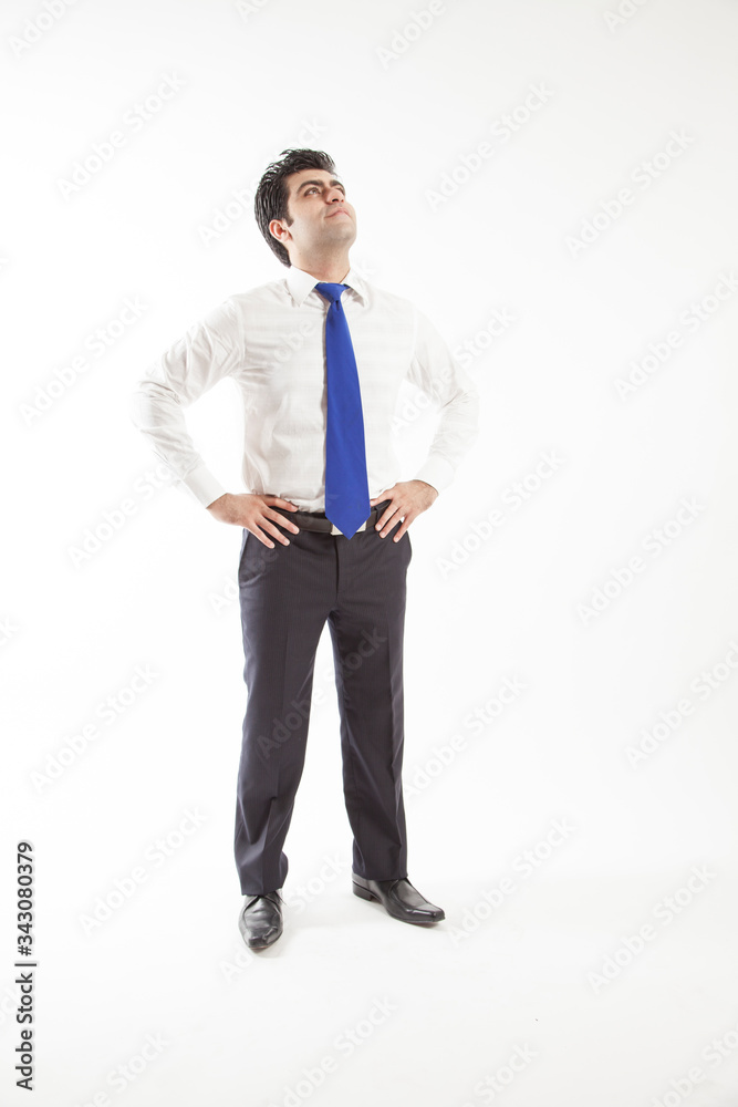 Young corporate office man looking up visioning future of work front view isolated on white background Young corporate office man looking up visioning future of work front view isolated on white background