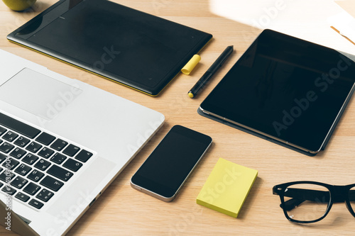 Stylish office table desk. Workspace with laptop. Close up.