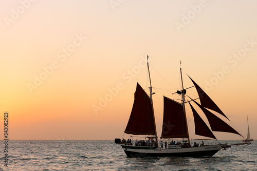 Sailing Boat on the Ocean at Sunset at Fort Zachary Taylor Historic State Park, better known as Fort Taylor. 