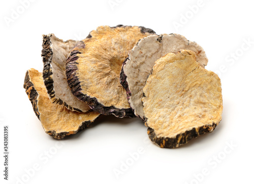 Peruvian ginseng or maca Lepidium meyenii, dried root and pow ，slice on a white background  photo