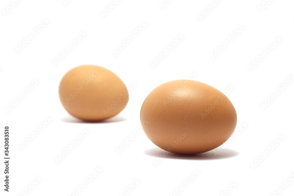 Two chicken eggs isolated on white background Two chicken eggs isolated on white background