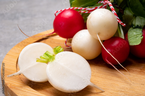 Fresh washed white and red radish vegetables ready to eat