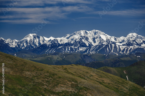 Spectacular view from the top of the mountain to the mountain range in the Ulagansky District of the Altai republic, Russia