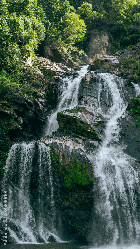 Obraz premium Krung Ching Waterfall in rainning season. There is placed in Abundant forest at Nakhon Si Thammarat province.