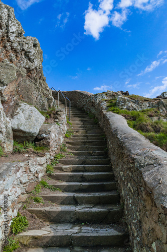 Steps leading down to the lighthouse, Wales.