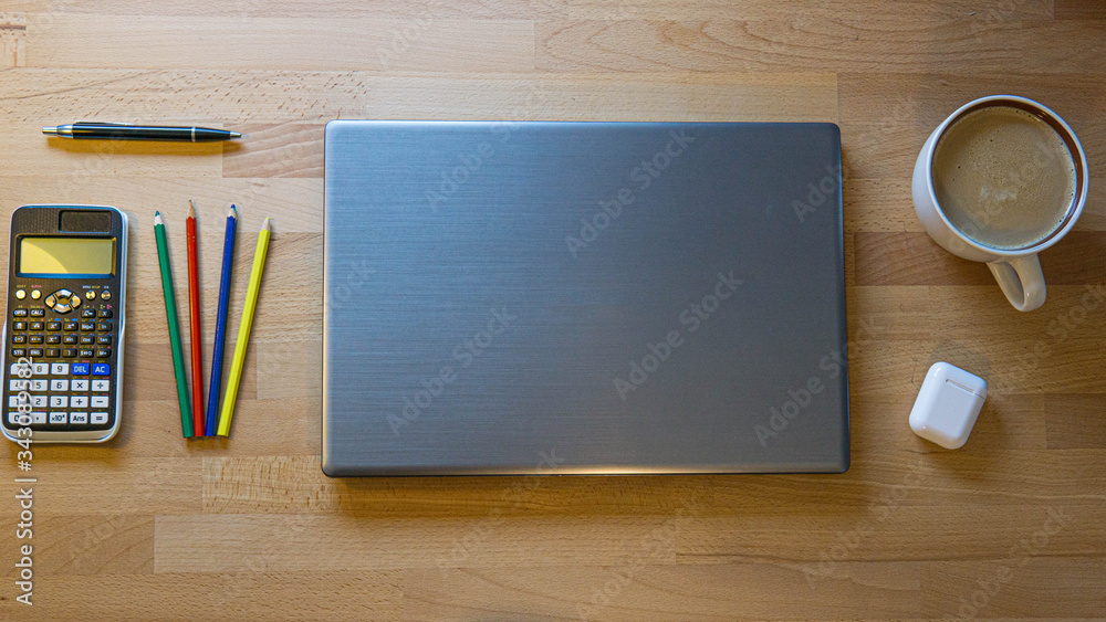 office and school supplies on wooden table office and school supplies on wooden table