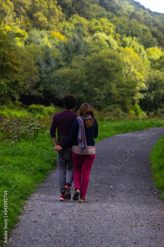 Quelven, Bretagne, France - September 1 2019: Couple walking on the woods