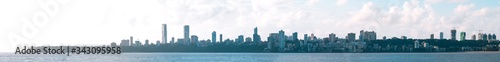 A wide panorama of the skyline seen from Marine Drive, South Mumbai. The panorama begins with Malabar Point- the tip of the Walkeshwar peninsula, and ends at Kemps Corner.