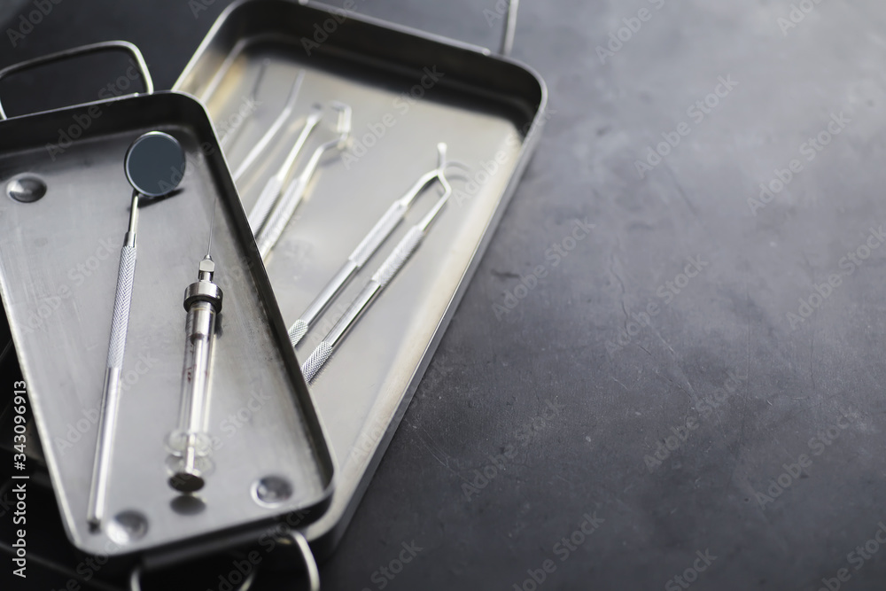 Equipment for the dental office. Orthopedic Instruments. Dental technician with working tools. Dentist metal tools. Equipment for the dental office. Orthopedic Instruments. Dental technician with working tools. Dentist metal tools.