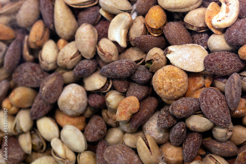 Different nuts background. Selective focus in perspective