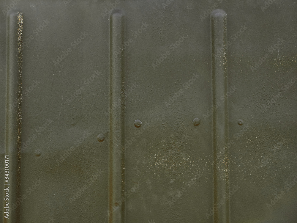 The metal texture of military equipment. Details of military equipment