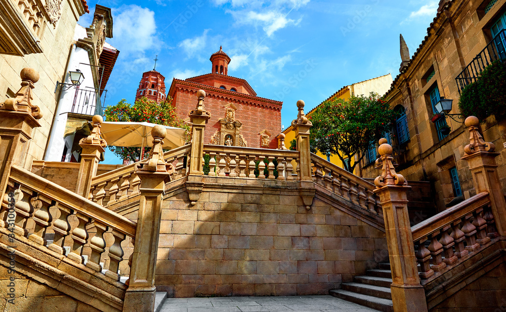 Vintage stairs in Spanish village (Poble Espanyol) museum open air in Barcelona. Spain. Traditional building in old town. Scenic landscape landmark.