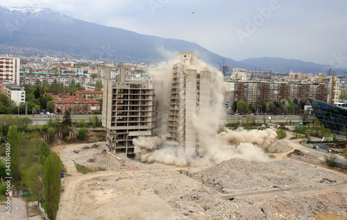 Принти на полотні Controlled explosion with blasts of a unfinished and abandoned empty high building, printing press house IPK Rodina, in Sofia, Bulgaria on 04/26/2020