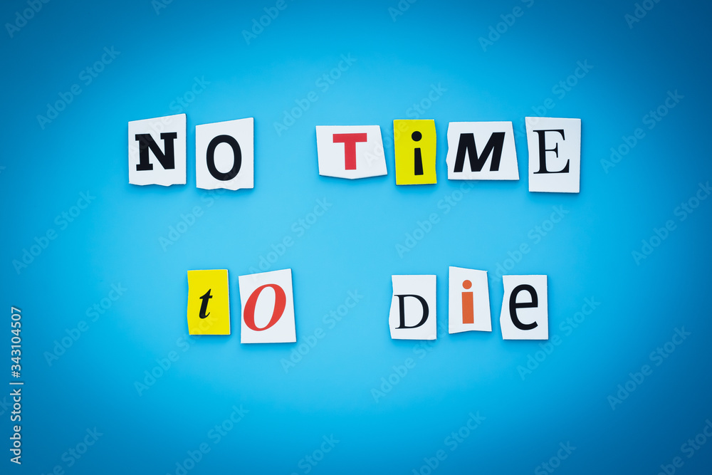 Obraz premium A word writing text - no time to die. Cartoon colorful letters on a blue background. Headline, banner with inscription font. Coronavirus prevention concept.