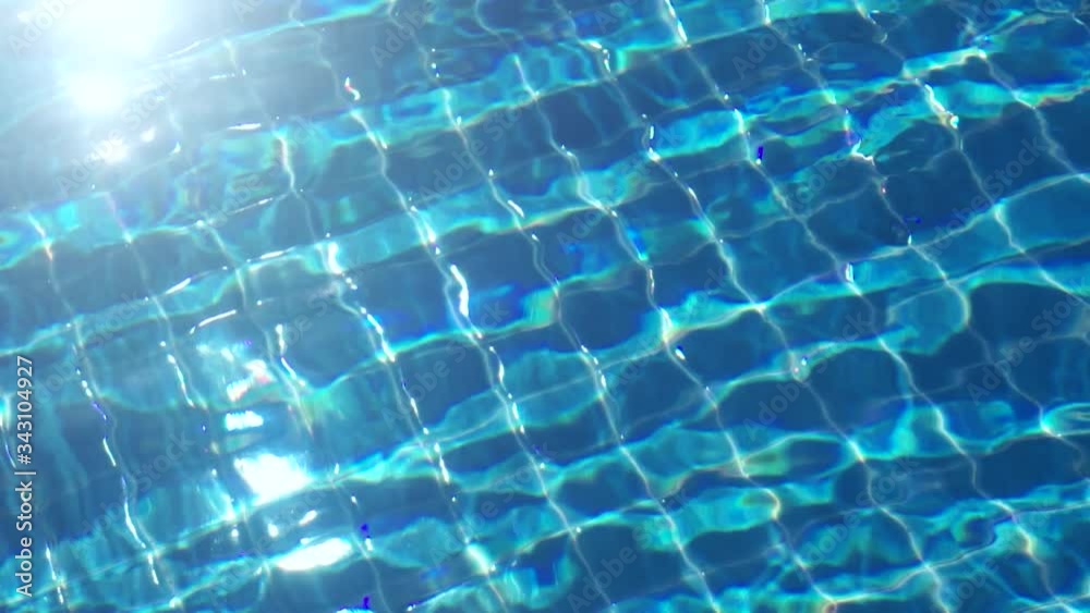 blue water in the pool with light reflections blue water in the pool with light reflections