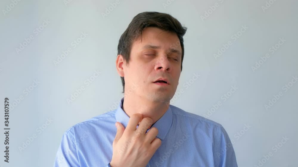 Man in oxygen mask due to difficulty in breathing in coronavirus pandemic, portrait on white background. Making deep breathes. Breathing problem. Worldwide COVID-19 epidemic. Fighting 2019-ncov virus. Man in oxygen mask due to difficulty in breathing in coronavirus pandemic, portrait on white background. Making deep breathes. Breathing problem. Worldwide COVID-19 epidemic. Fighting 2019-ncov virus.