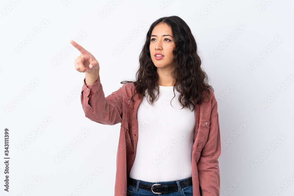 Spanish Chinese woman over isolated white background touching on transparent screen Spanish Chinese woman over isolated white background touching on transparent screen