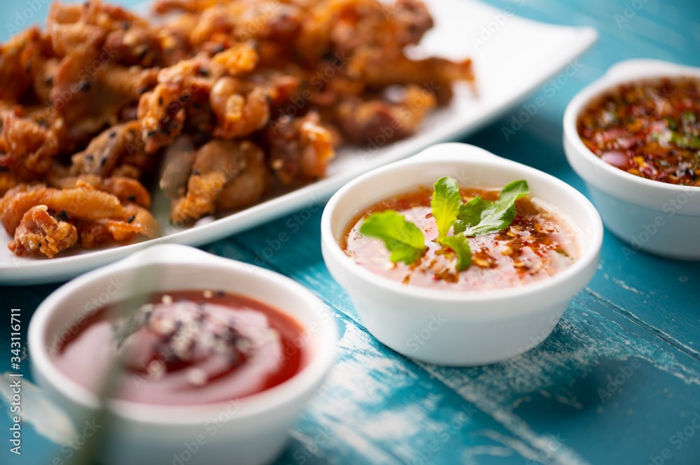 Crispy fried sliced belly pork with spicy sauce Crispy fried sliced belly pork with spicy sauce