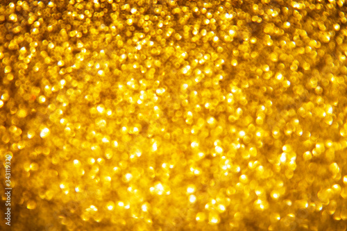 Golden abstract bokeh background, texture. Lights festive background concept.