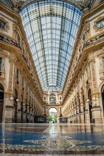 Empty streets due to covid-19 virus. Lockdown in european town. Strange spring in Milan galleria Vittorio Emanuele Italy. Report from deserted cities people are locked up. Nobody can go out all closed