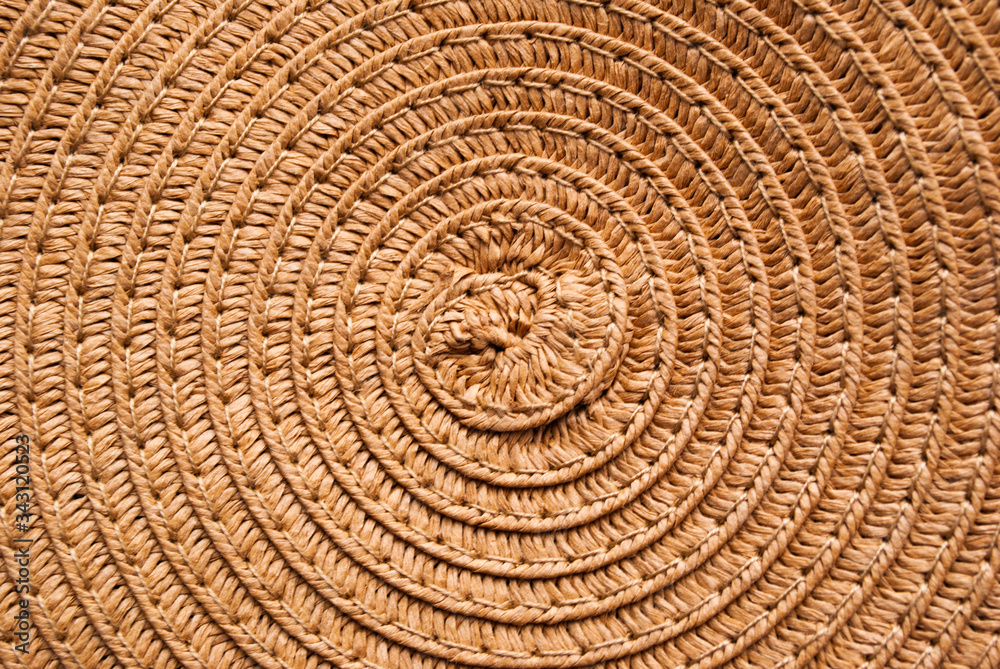 Naklejka premium ethnic bag with weaving, round vines, with fabric ribbons, accessories. texture, background