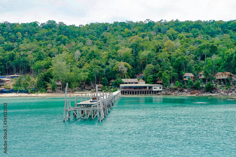 The beautiful tropical beach of Koh Rong, the paradise island with a nice bungalow, forest, coast, and white sand. Koh Rong island is a popular tourist destination in Sihanoukville, Cambodia
