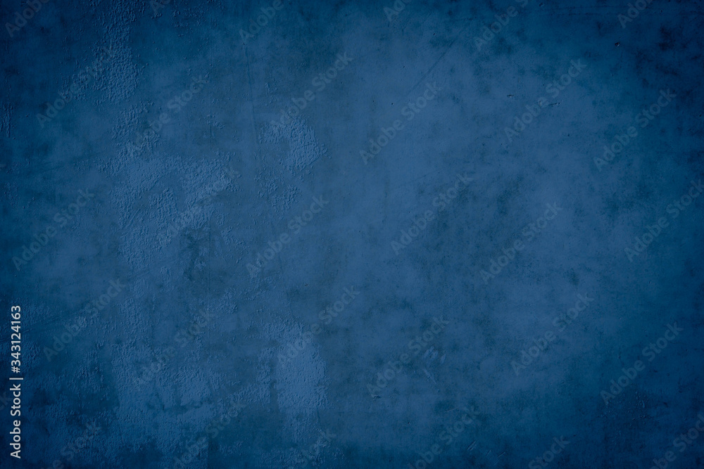 Naklejka premium Abstract grunge decor. Beautiful dark blue stucco wall background. Space for designing and inserting text.