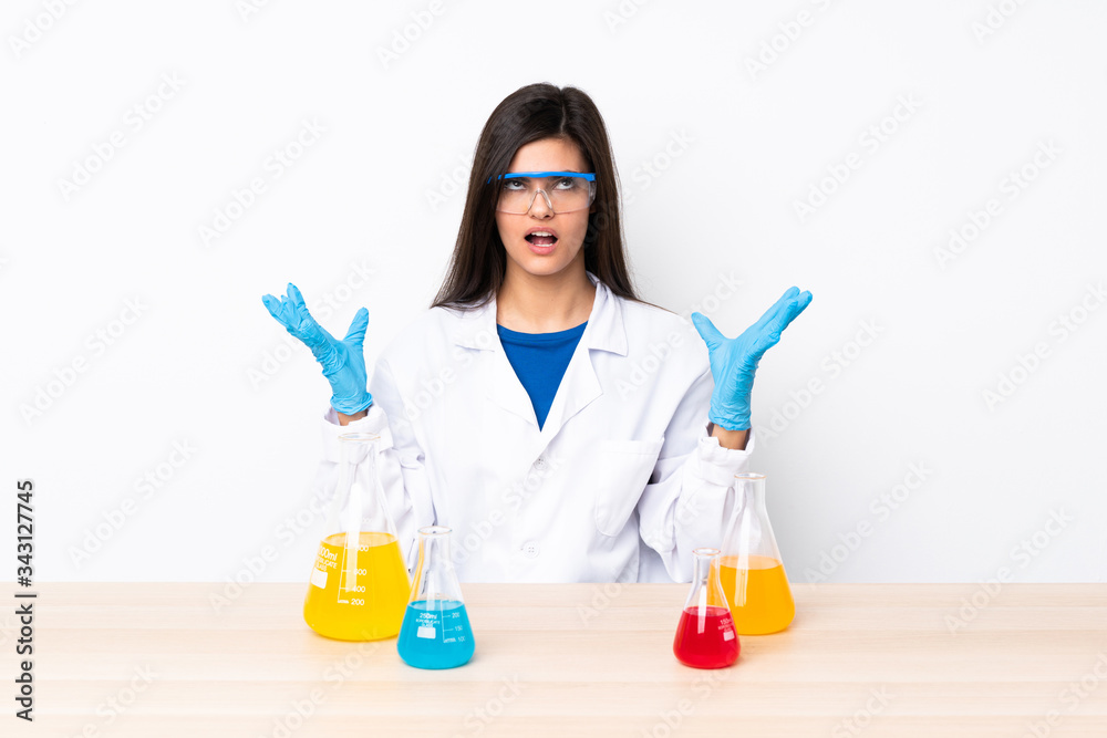 Young scientific woman in a table frustrated by a bad situation Young scientific woman in a table frustrated by a bad situation